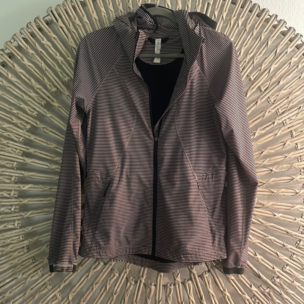 Vintage Lululemon windbreaker.  Pink and black stripped Size 6